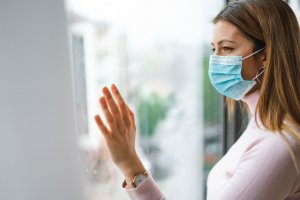 1608016204_woman-wearing-medical-face-mask-against-the-corona-4etzx4s-min