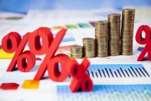 1613575803_depositphotos_71068531-stock-photo-financial-graph-from-coins-with